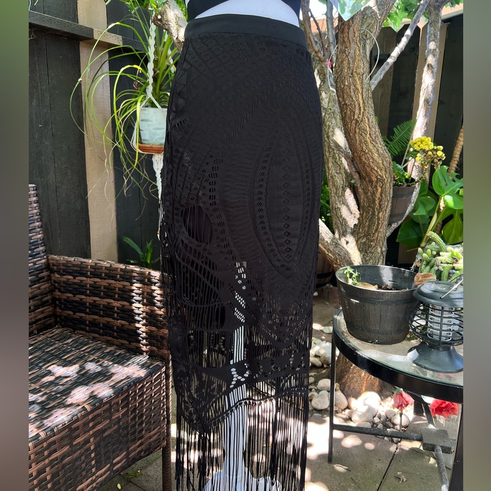 Black cutout skirt with fringe detailing
